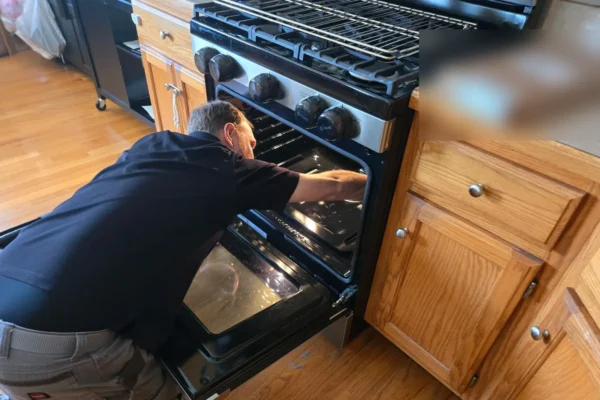 Unique Repair technician repairing a gas oven